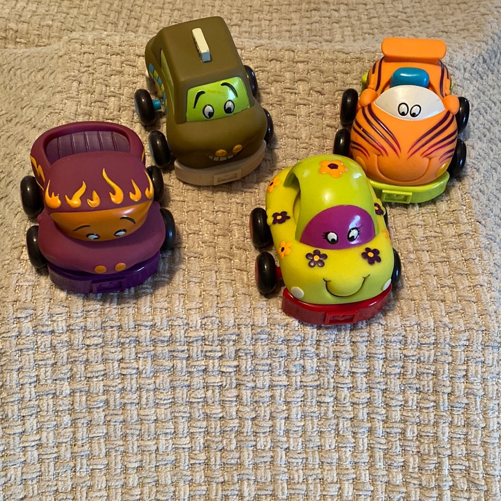 4 pull back toy cars!